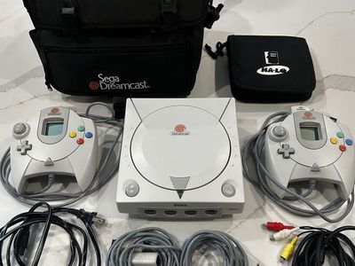 SEGA Dreamcast Bundle - 2 Controllers, 2 VMUs, 2 Jump Packs, 12 Games & Carrying Bag