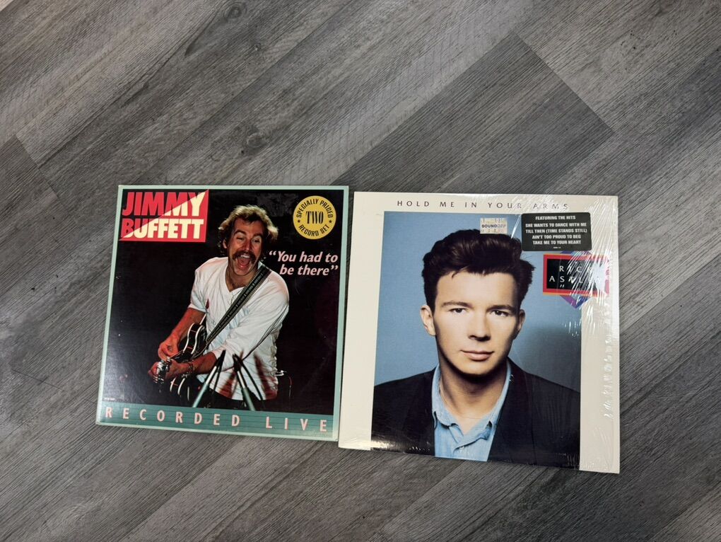 Jimmy Buffett & Rick Astley vinyl records