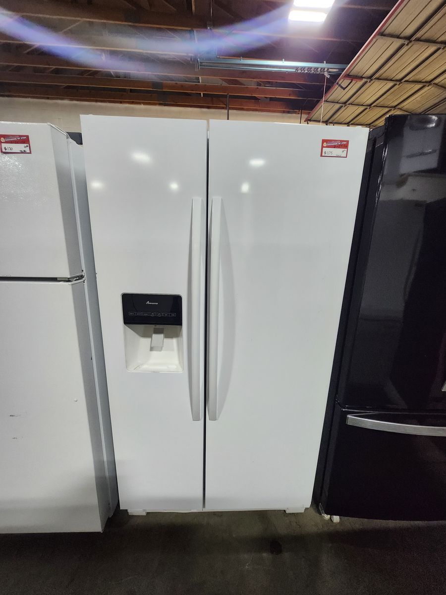 NICE AMANA SIDE BY SIDE FRIDGE! WITH A FULL WARRANTY