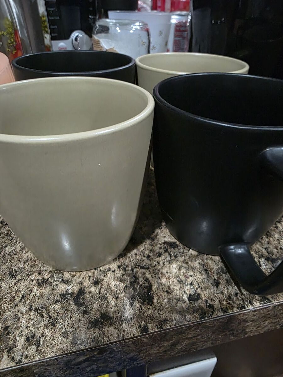 Coffee cups and coffee maker