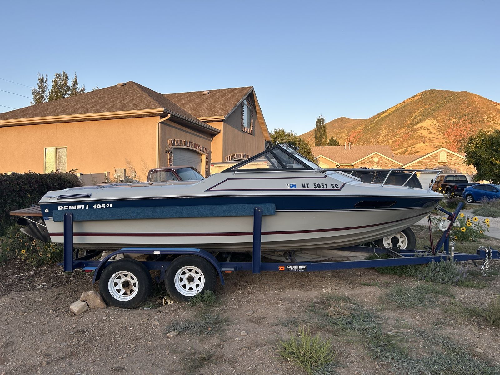 1987 19 FT Reinell Cuddy Cabin with trailer