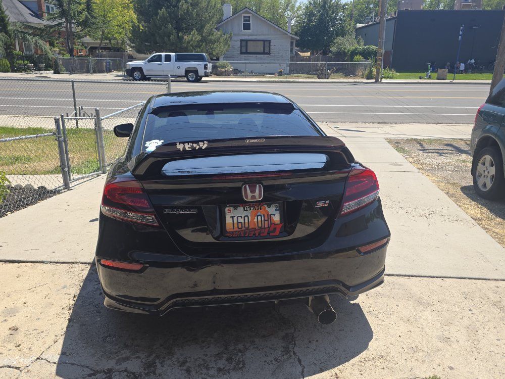 Honda Civic Si Coupe Black with Aftermarket Wheels and Exhaust