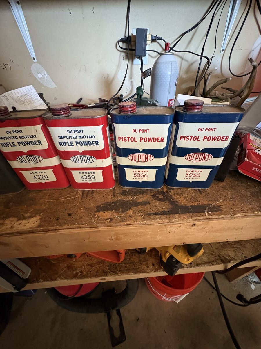 Seven containers of reloading powder