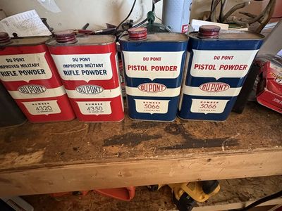 Seven containers of reloading powder