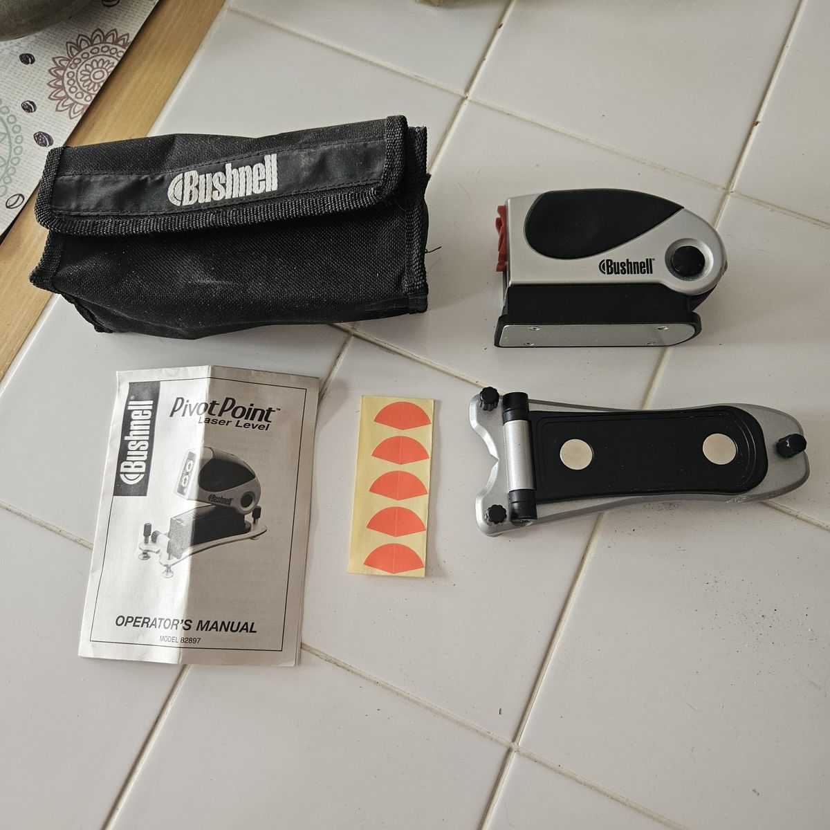 Bushnell PivotPoint Laser Level Model 82897 with Base Case and Manual