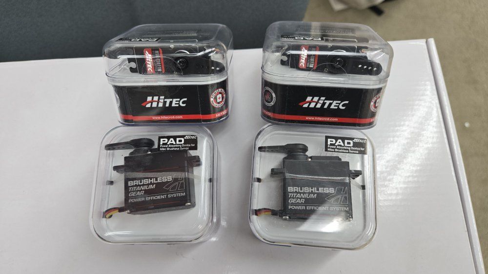 4 brand new Hitec HSB 9381-TH servos.