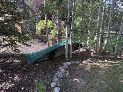 Old Town canoe with flip-up seatbacks and two paddles included