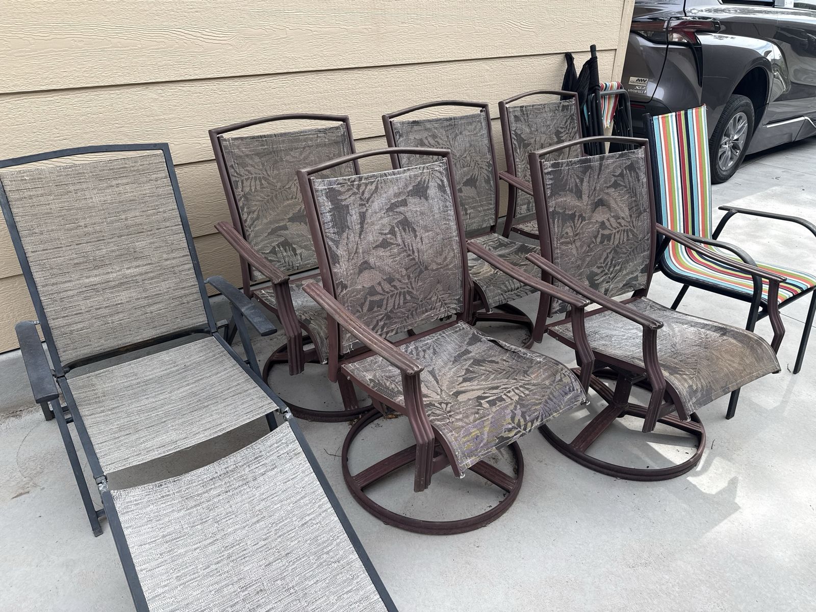 Set of 6 Heavy Cast Aluminum Swivel Patio Chairs & 1 Lounge Chair - Sun Damaged