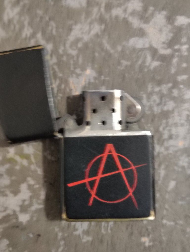 Vintage Zippo Windproof Lighter Black with Red Anarchy Symbol 2007