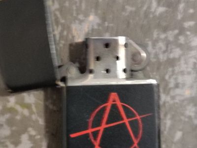 Vintage Zippo Windproof Lighter Black with Red Anarchy Symbol 2007