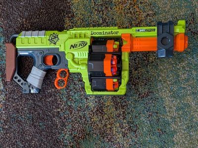 NERF Zombie Strike Dominator Blaster - High Capacity Dart Drum Toy Gun