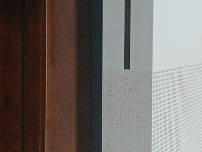 Microsoft Xbox One S White Console comes with a wired remote and two games.