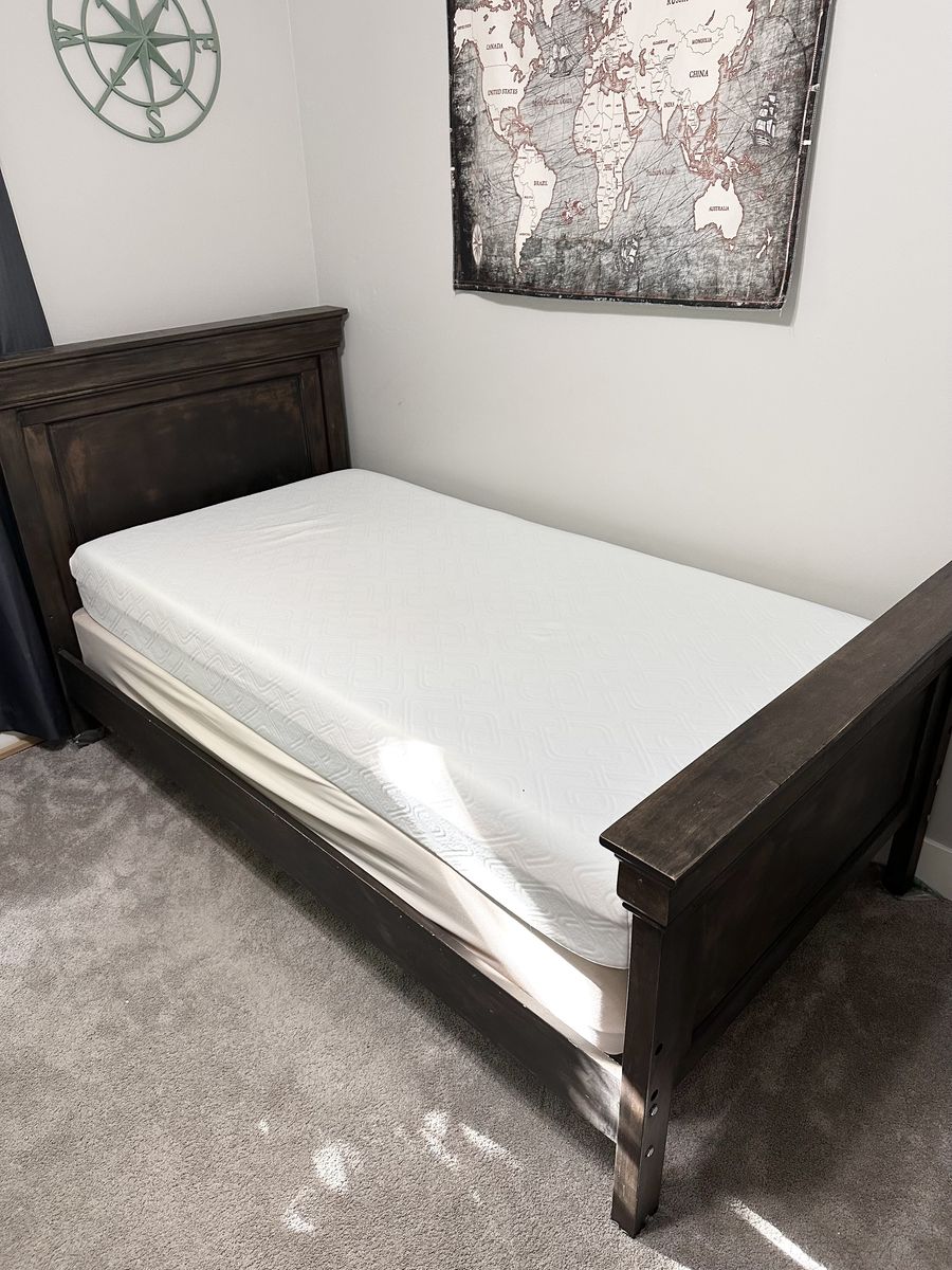 Twin Bed w/ like new mattress 