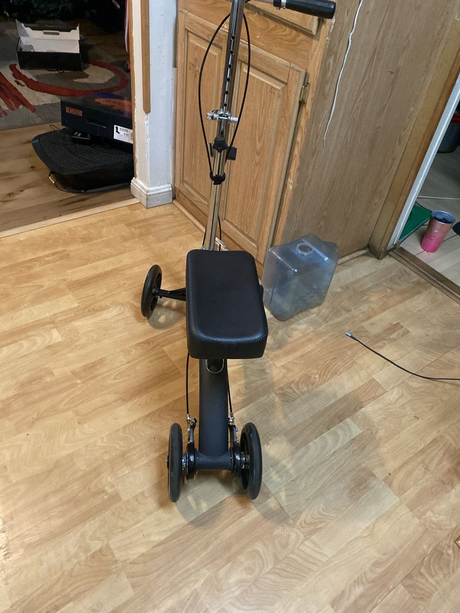 Scooter kneeUnbranded 3-        Scooter Walker Mobility Aid           Adjustable, Black,  like N,   Tires breaks.   Great C. In