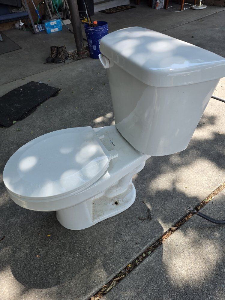 White Two-Piece Elongated Toilet with Tank and Seat