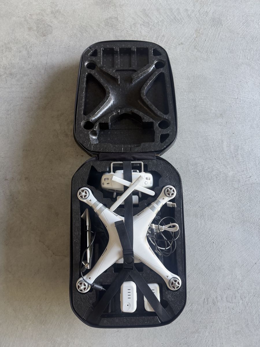 DJI Phantom 4 Drone with Controller, Charger, and Carry Case