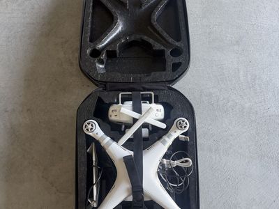 DJI Phantom 4 Drone with Controller, Charger, and Carry Case