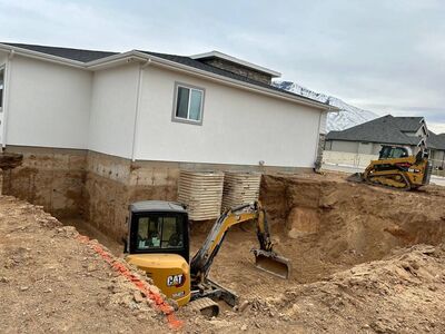 Professional Excavation | Custom Sprinkler Installation | Land Clearing | Rock Walls | Grading | Trenching | Trampoline Pits