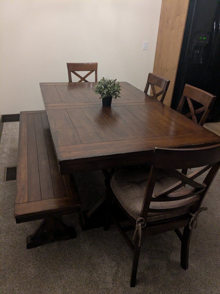 Rectangle dining table with built-in leaf,  6 chairs and bench.