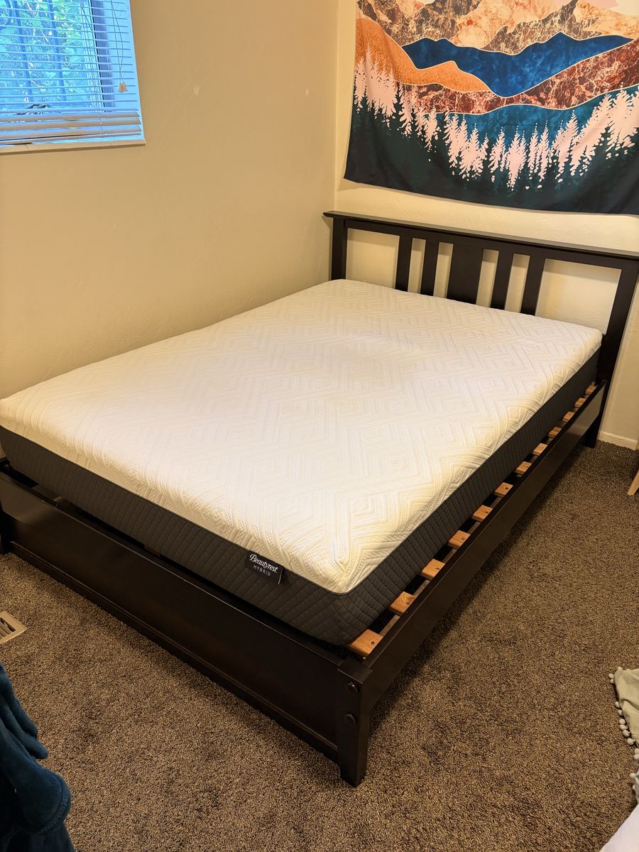 Full Mattress and Black Wooden Frame