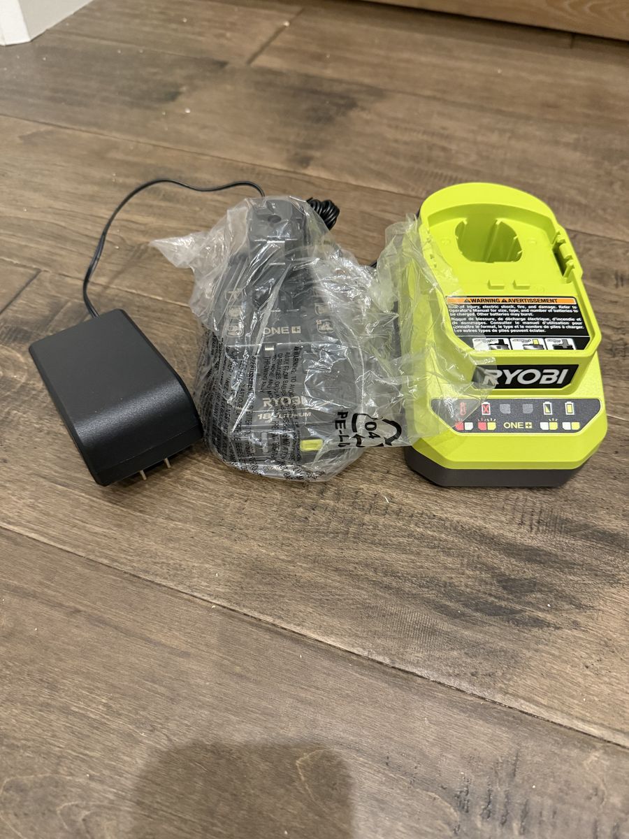 Brand new never used Ryobi Battery + Charger