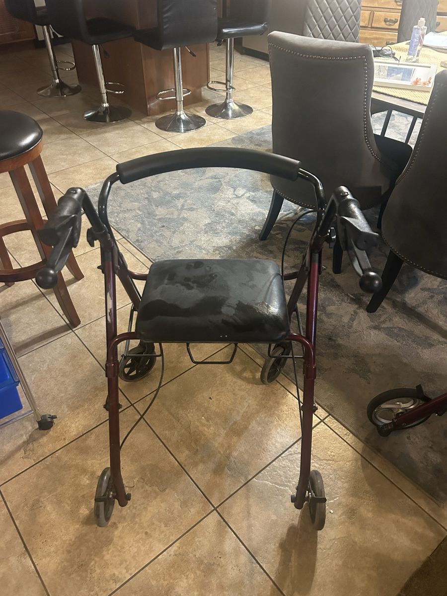 Red Mobility Walker with Seat and Wheels - Used