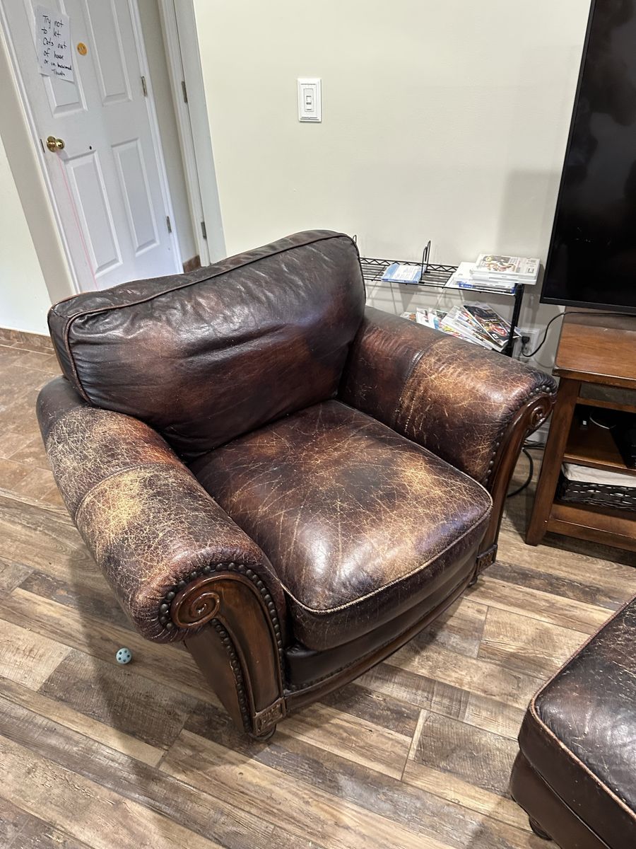 Distressed Brown Leather Living Room Set with Sofa, Armchair, and Ottoman