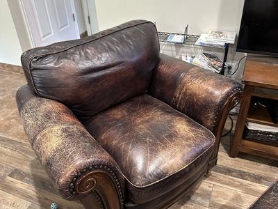 Distressed Brown Leather Living Room Set with Sofa, Armchair, and Ottoman