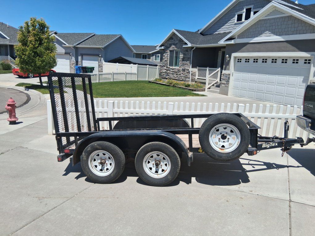 BigTex Utility Trailer, 5'x10', tandem axle with Wood Deck with Mesh Ramp
