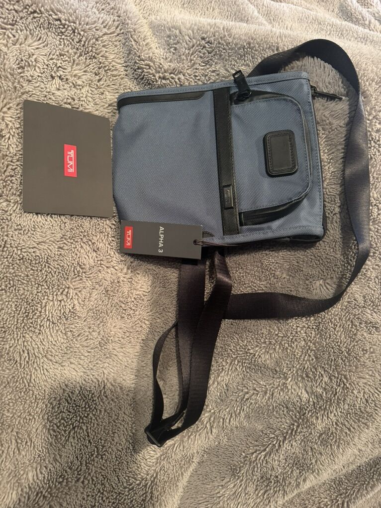 New TUMI Small sling Bag
