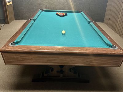 Yorktown Brunswick Pool table with ping pong table top, paddle set and pool cues