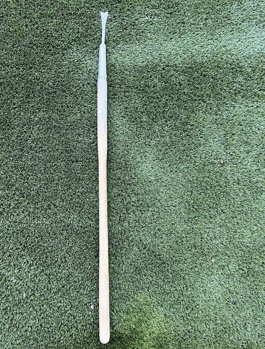 Set of green 11 bamboo stakes and weed digger.
