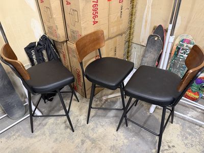 Black and brown barstools