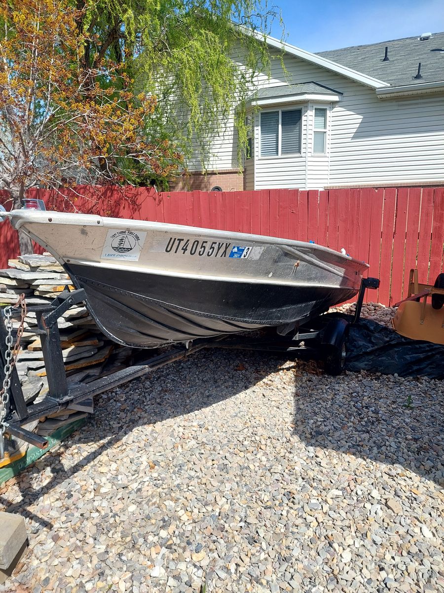 14 foot boat, 7.5hp motor and trailer.