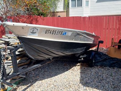 14 foot boat, 7.5hp motor and trailer.