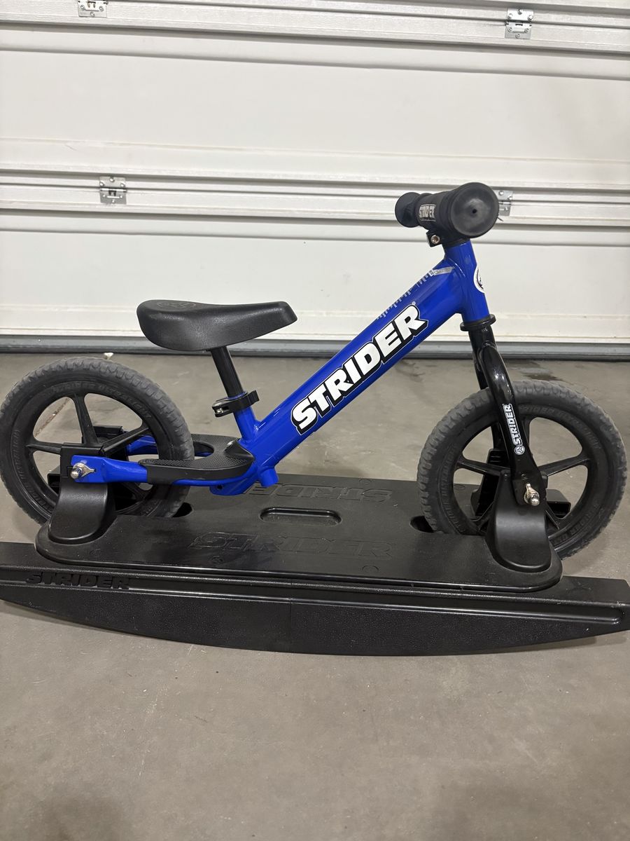 Strider with rocker base