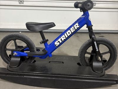 Strider with rocker base