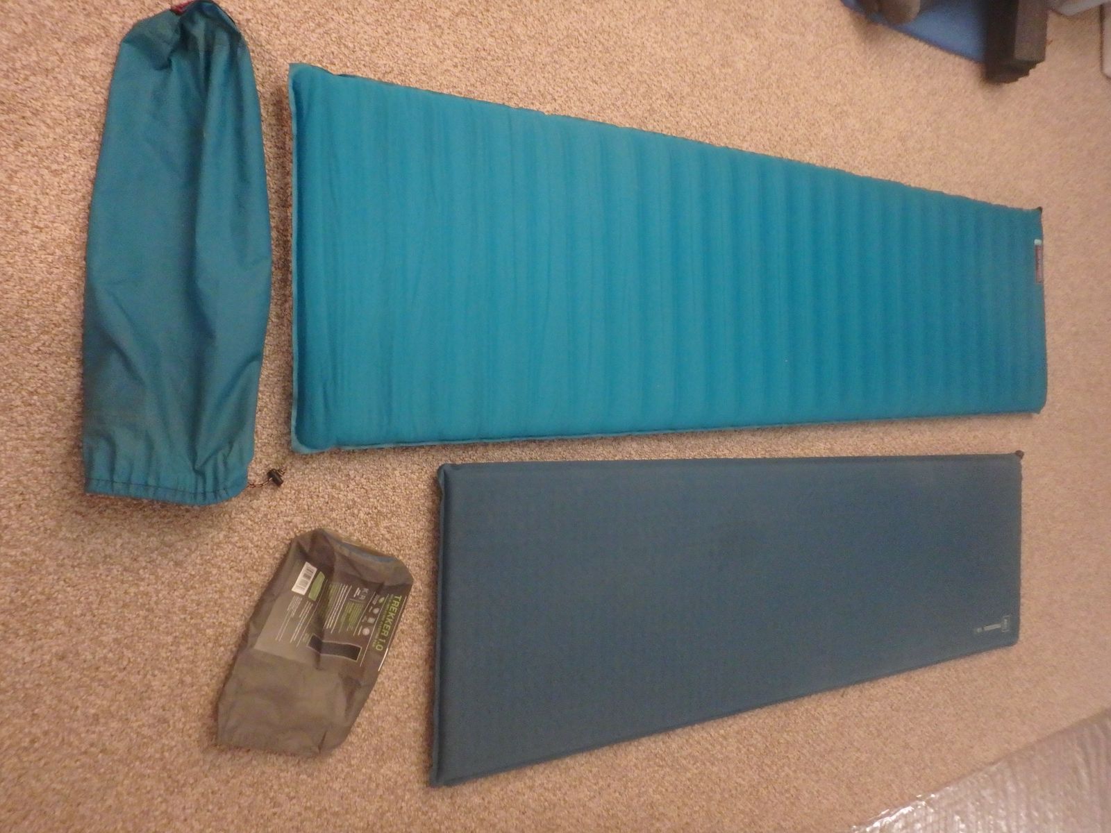 Thermarest backpacking sleeping pad and REI Trekker sleeping pad
