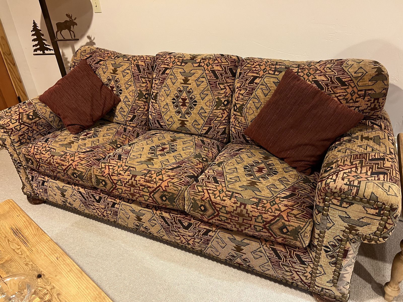 Queen sofa bed with matching upholstered chair and ottoman