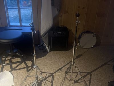 Two cymbal stands, one highhat one ride/crash