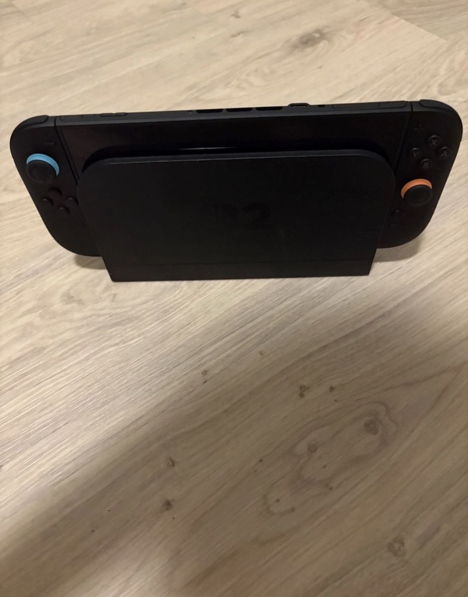 Nintendo Switch Console with Dock and dbrand Screen Protector