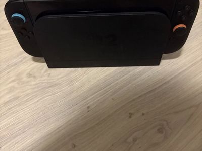 Nintendo Switch Console with Dock and dbrand Screen Protector