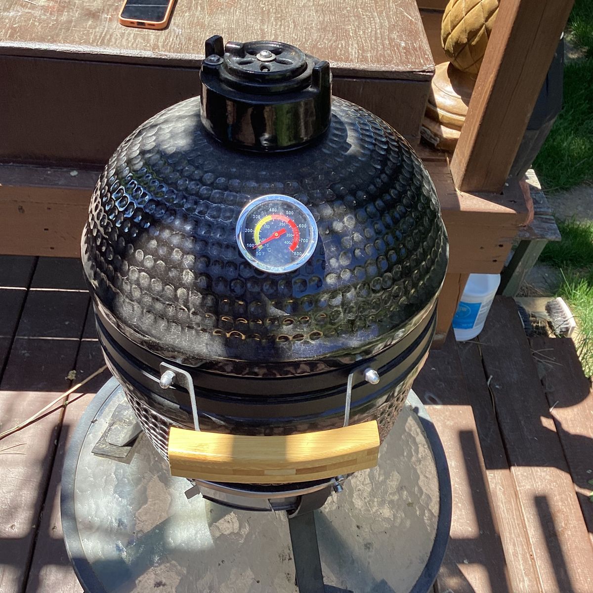 Kamado style ceramic smoker and grill