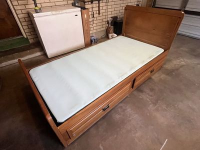 Wood twin bed frame with drawers