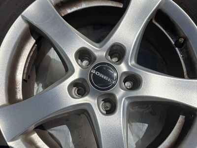 Borbet 5-Spoke Alloy Wheels with Pathfinder Tires 215/70R16 Used