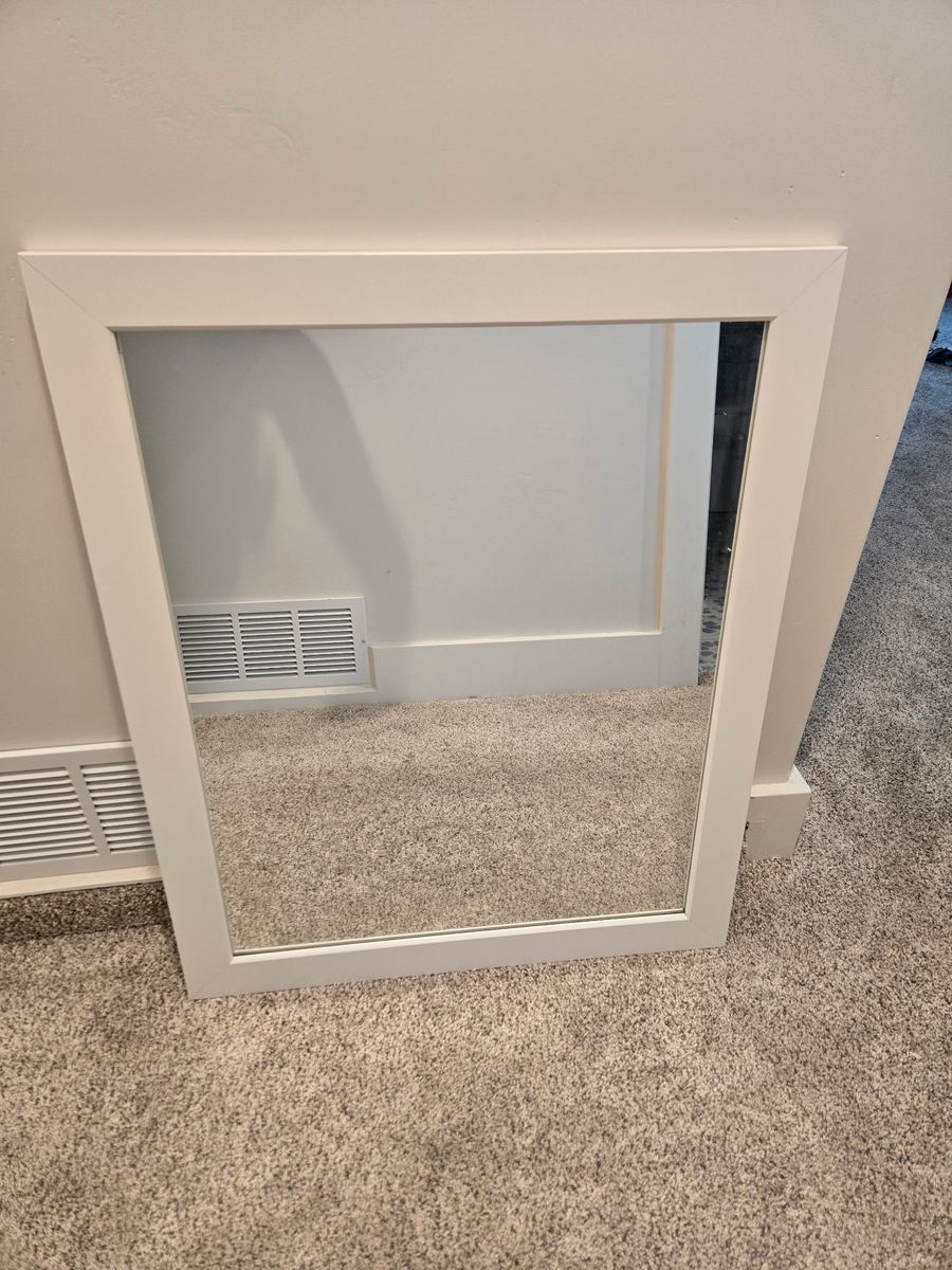 white framed mirror