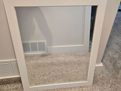 white framed mirror