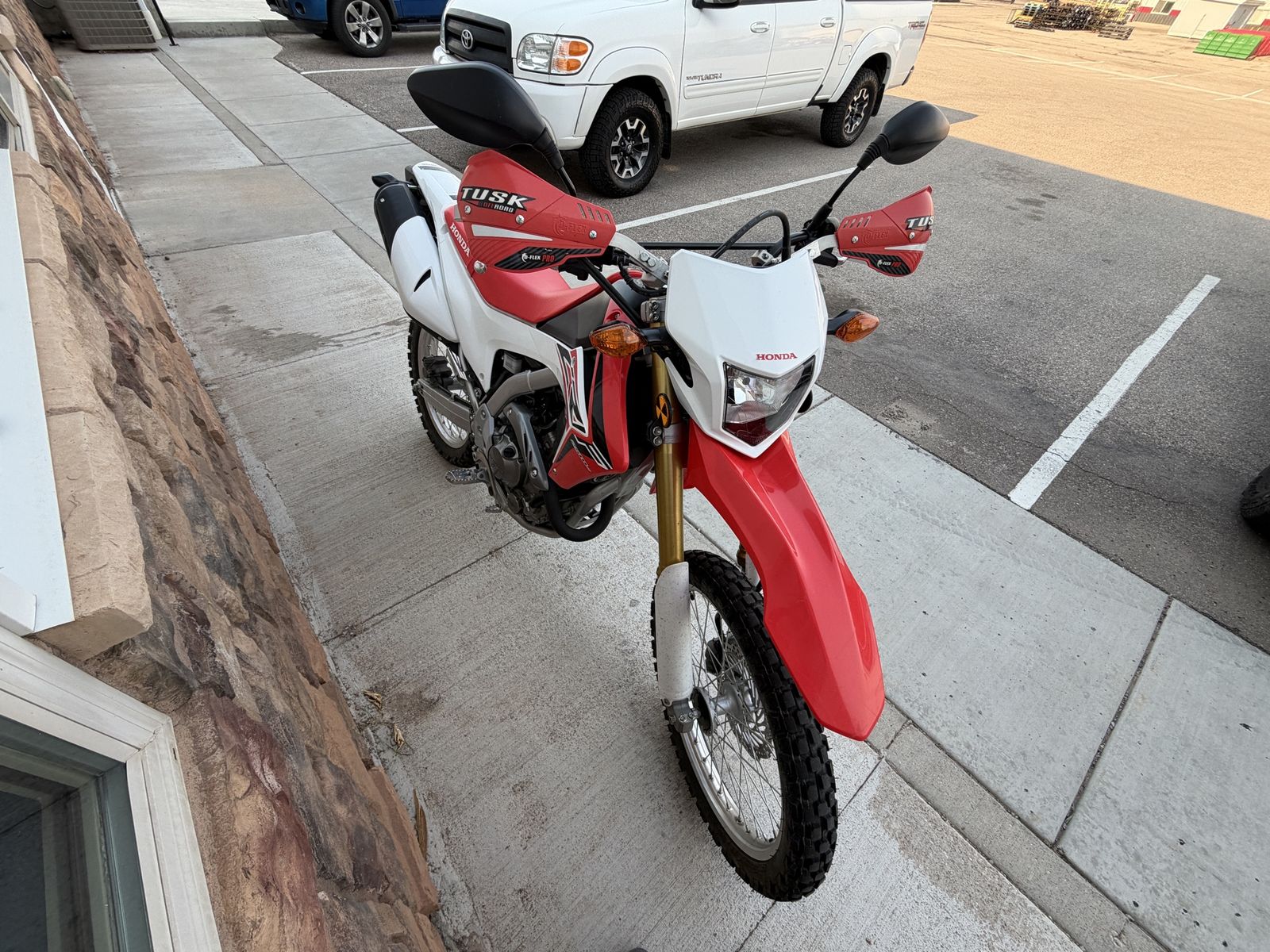 Honda CRF250L Dual Sport Motorcycle with Tusk Handguards