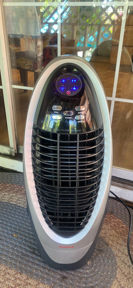 Fan.  Water.  . Water.  Runs Honeywell HY-200       QuietSet Whole-Room Tower      Fan with Oscillating Cooling