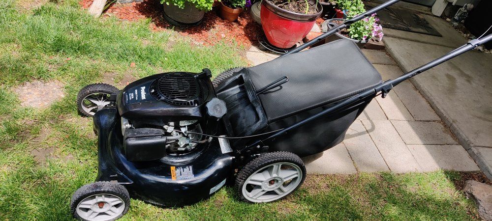 poulan push mower 6.5 HP overhead valve engine.